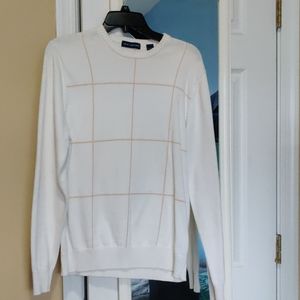 White and gold sweater